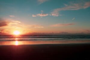 Sunset over a sea; photo from Pexels by Luis Rodrigues.