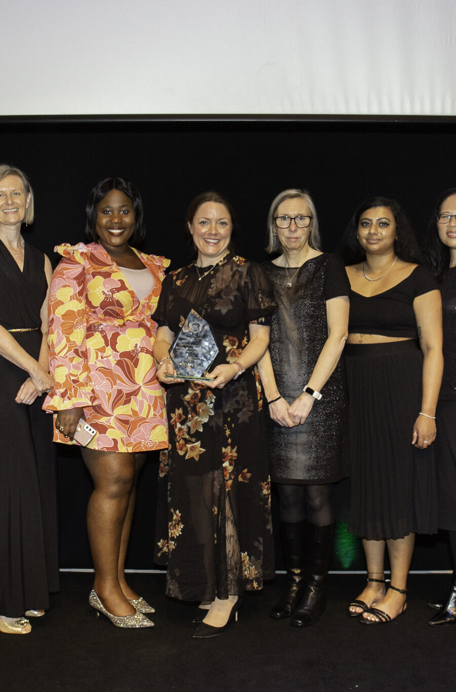 C-DICE team on the stage, holding their Vitae ICE Award.